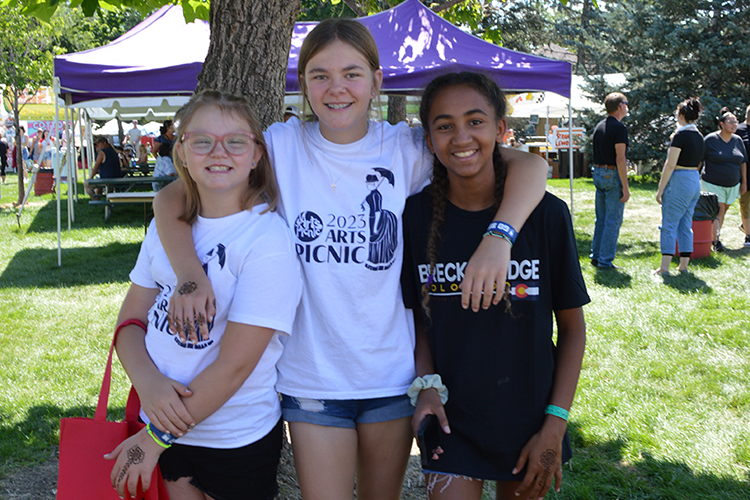 Three friends at Arts Picnic 2023